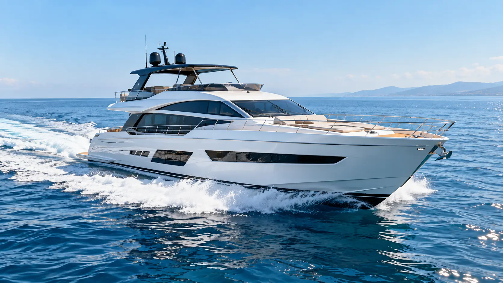 Motor yacht underway on open coastal water